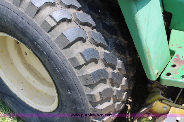 image for item J1024 John Deere 855 MFWD garden tractor