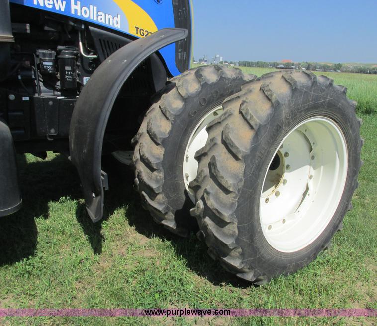 image for item A8729 2006 New Holland TG275 MFWD tractor