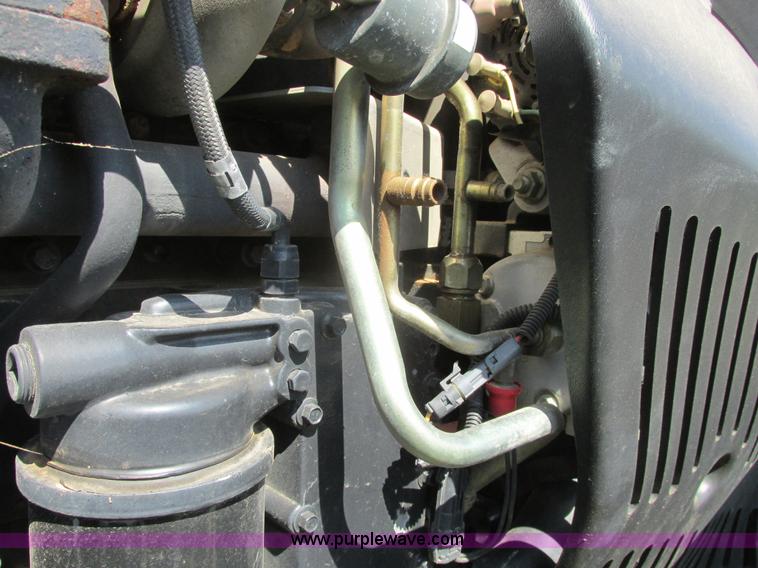 image for item A8729 2006 New Holland TG275 MFWD tractor