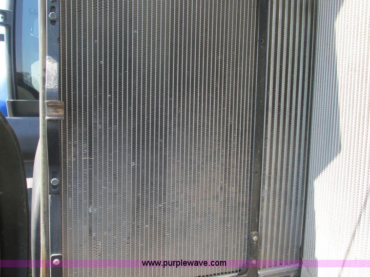 image for item A8729 2006 New Holland TG275 MFWD tractor