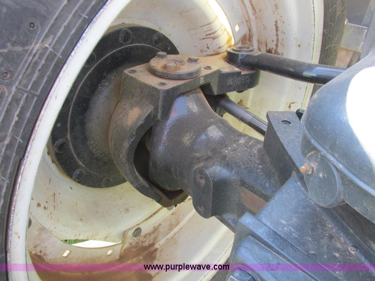 image for item A8729 2006 New Holland TG275 MFWD tractor