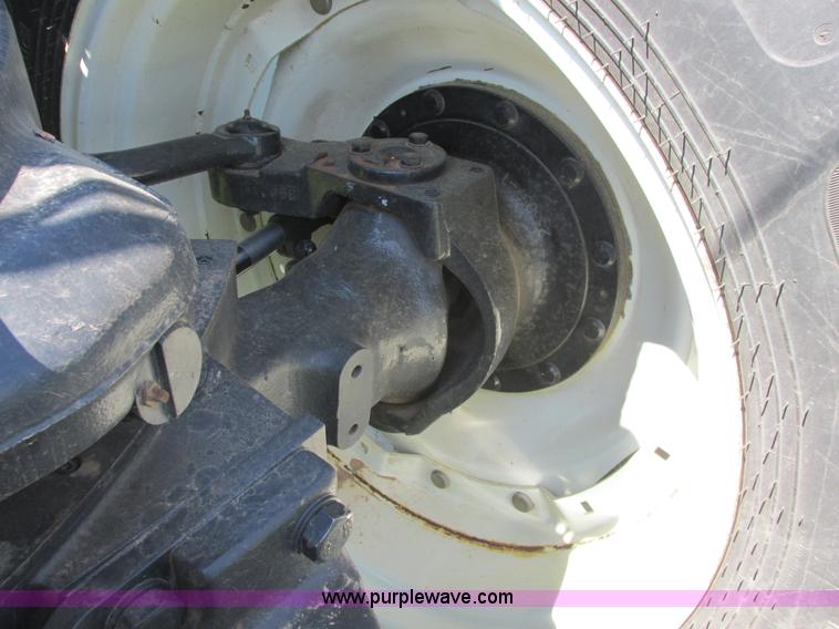 image for item A8729 2006 New Holland TG275 MFWD tractor