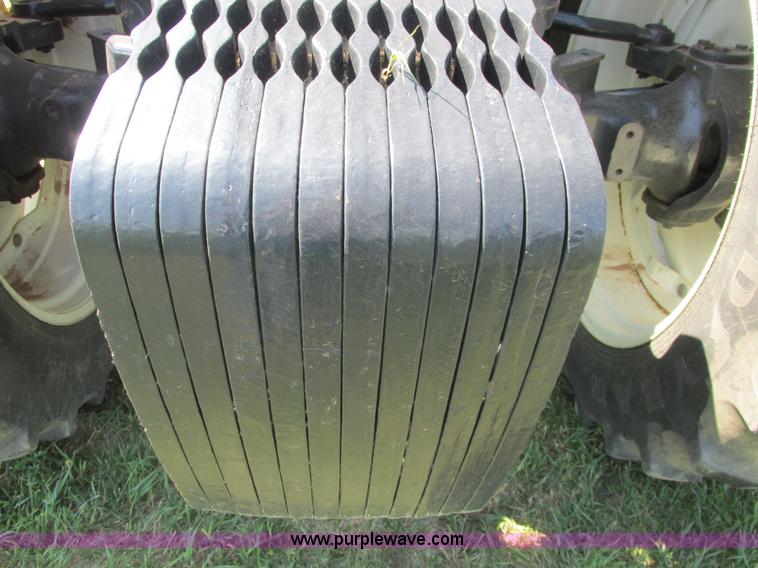 image for item A8729 2006 New Holland TG275 MFWD tractor