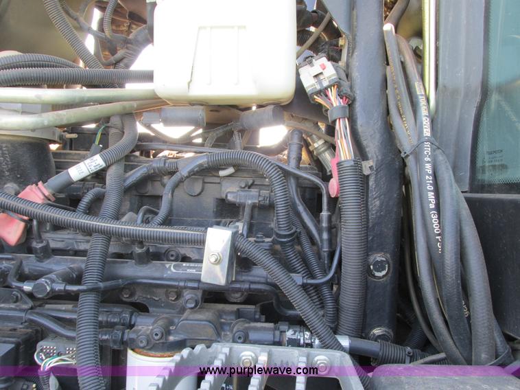 image for item A8729 2006 New Holland TG275 MFWD tractor