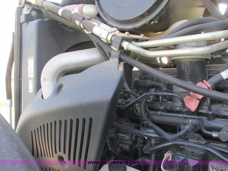 image for item A8729 2006 New Holland TG275 MFWD tractor