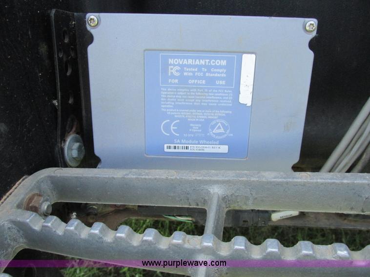 image for item A8729 2006 New Holland TG275 MFWD tractor