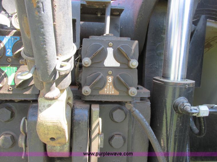 image for item A8729 2006 New Holland TG275 MFWD tractor