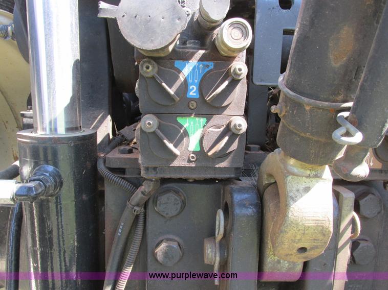 image for item A8729 2006 New Holland TG275 MFWD tractor