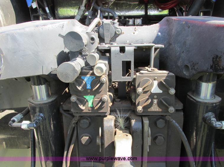 image for item A8729 2006 New Holland TG275 MFWD tractor