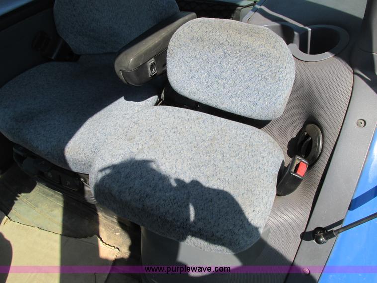 image for item A8729 2006 New Holland TG275 MFWD tractor