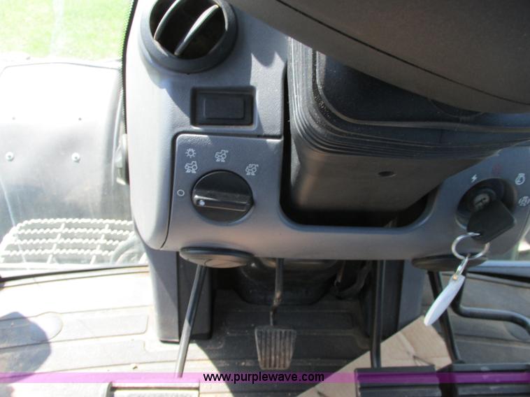 image for item A8729 2006 New Holland TG275 MFWD tractor