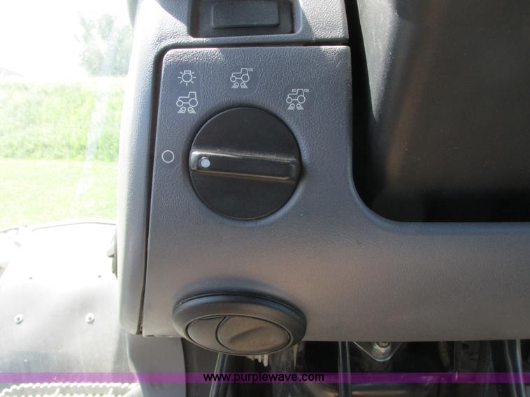 image for item A8729 2006 New Holland TG275 MFWD tractor