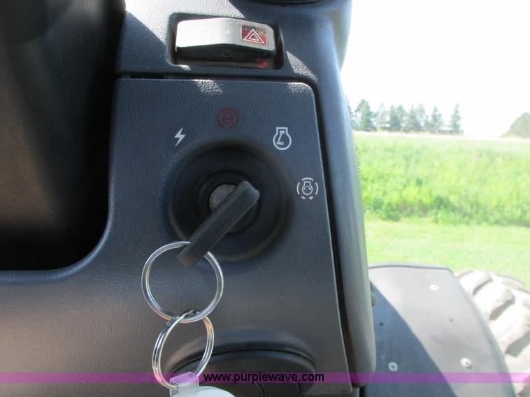 image for item A8729 2006 New Holland TG275 MFWD tractor