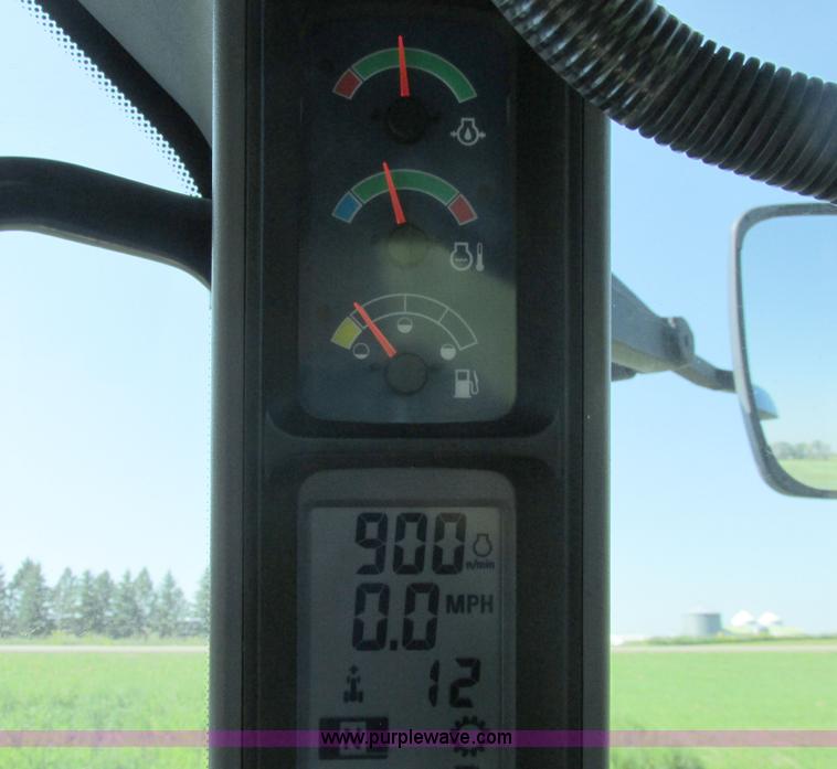 image for item A8729 2006 New Holland TG275 MFWD tractor