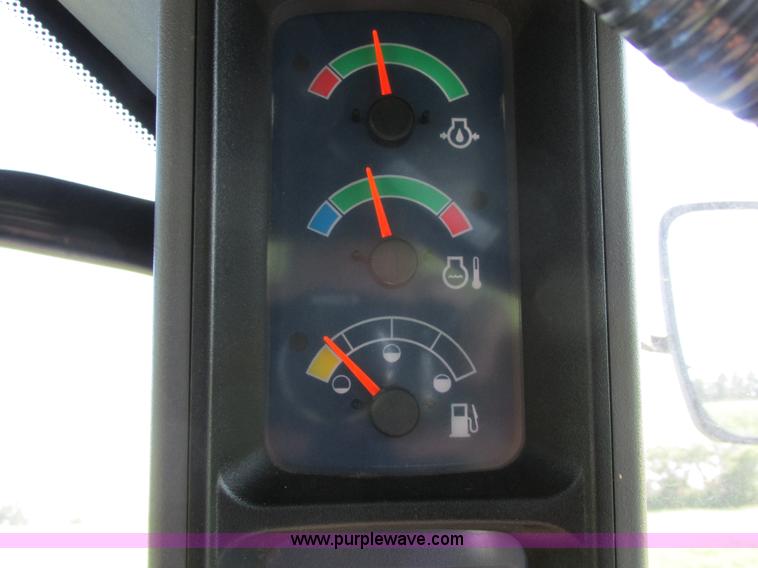 image for item A8729 2006 New Holland TG275 MFWD tractor