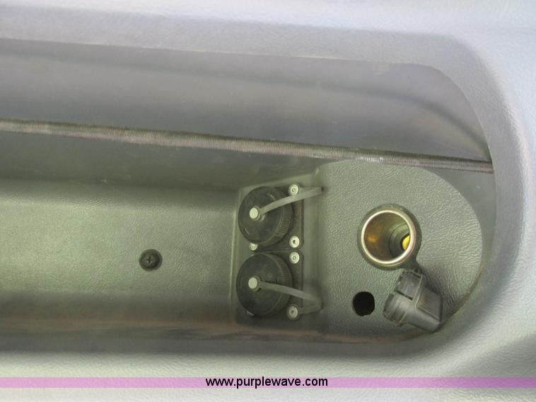 image for item A8729 2006 New Holland TG275 MFWD tractor