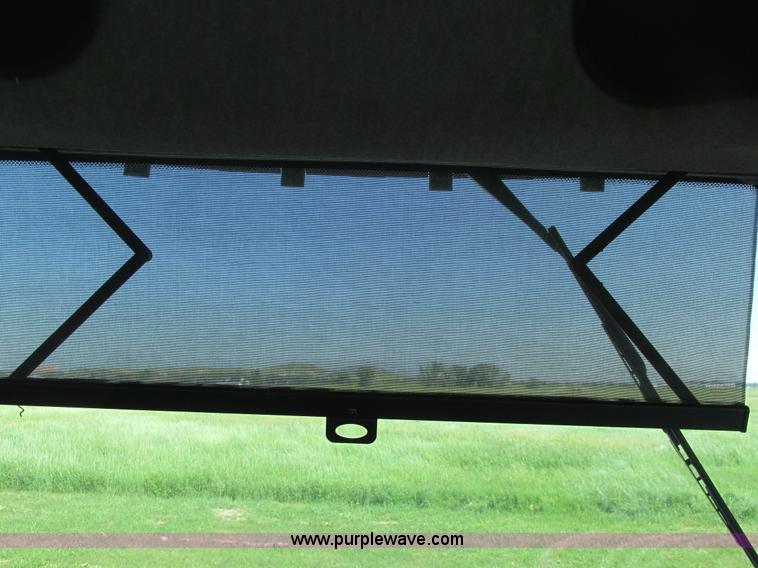 image for item A8729 2006 New Holland TG275 MFWD tractor