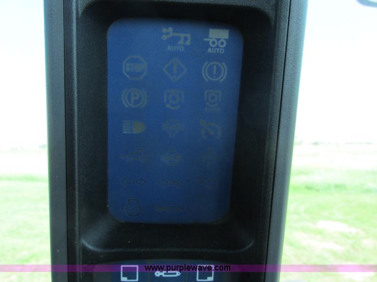 image for item A8729 2006 New Holland TG275 MFWD tractor