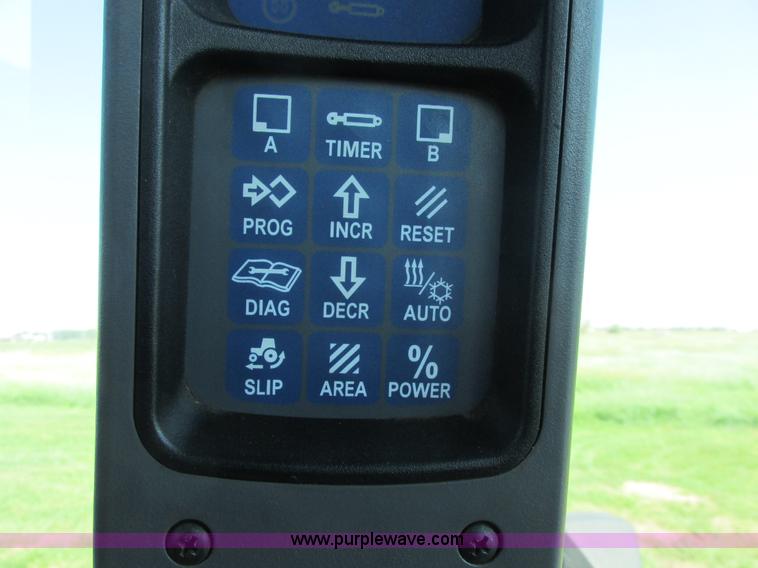 image for item A8729 2006 New Holland TG275 MFWD tractor