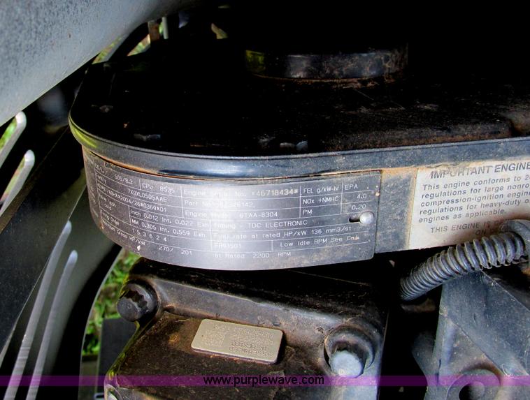 image for item A8729 2006 New Holland TG275 MFWD tractor