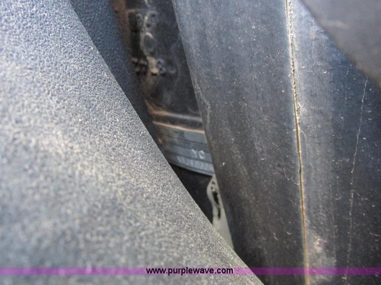 image for item A8729 2006 New Holland TG275 MFWD tractor