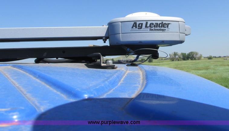 image for item A8729 2006 New Holland TG275 MFWD tractor