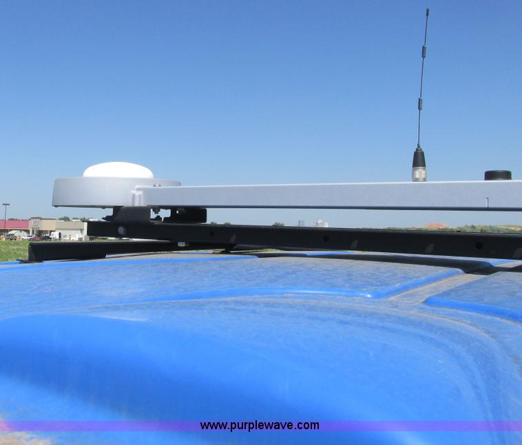 image for item A8729 2006 New Holland TG275 MFWD tractor