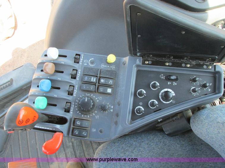 image for item A8729 2006 New Holland TG275 MFWD tractor