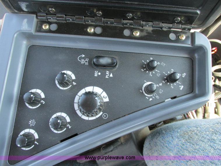 image for item A8729 2006 New Holland TG275 MFWD tractor