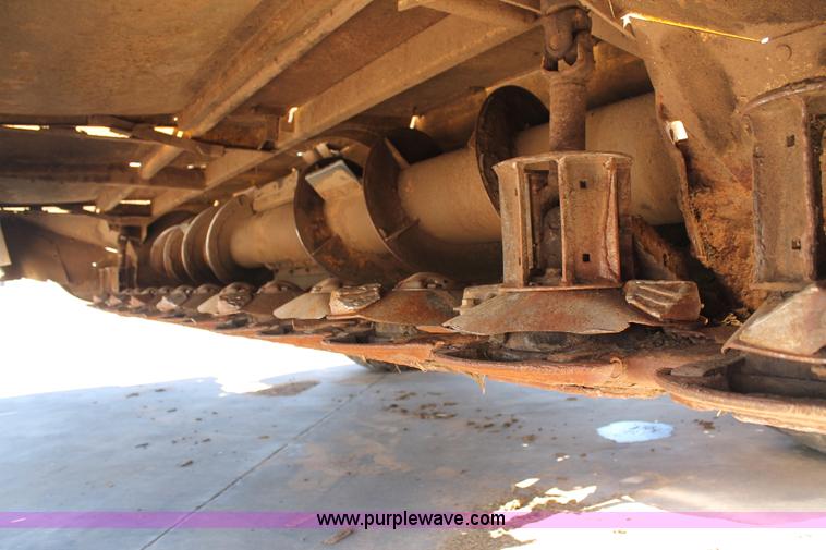 image for item C3892 2006 New Holland HW365 self-propelled windrower