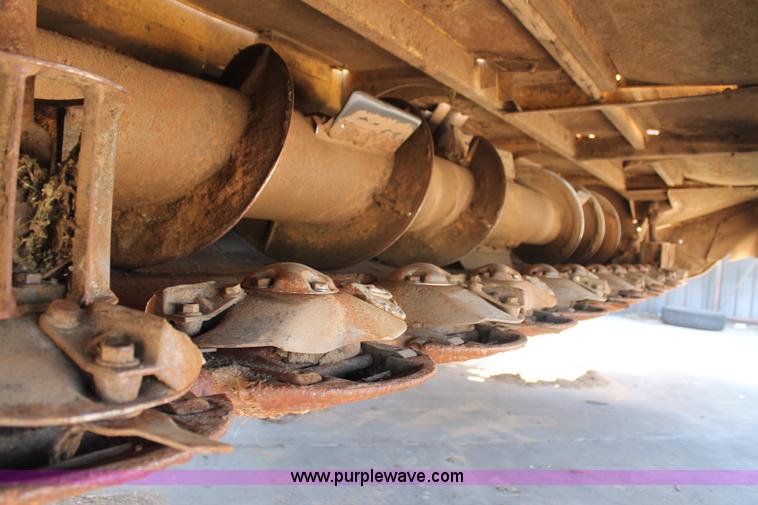 image for item C3892 2006 New Holland HW365 self-propelled windrower