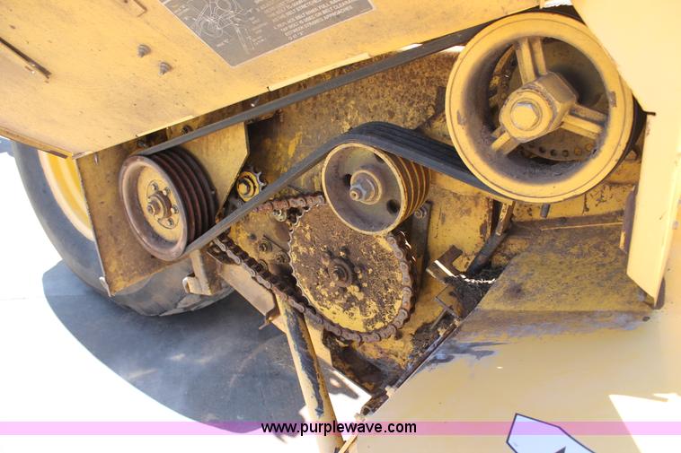 image for item C3892 2006 New Holland HW365 self-propelled windrower