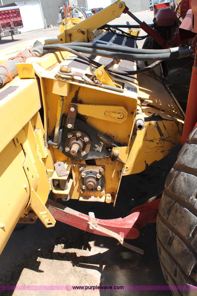 image for item C3892 2006 New Holland HW365 self-propelled windrower