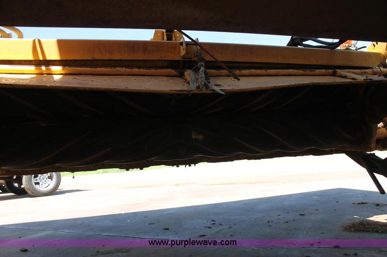 image for item C3892 2006 New Holland HW365 self-propelled windrower