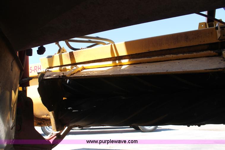 image for item C3892 2006 New Holland HW365 self-propelled windrower