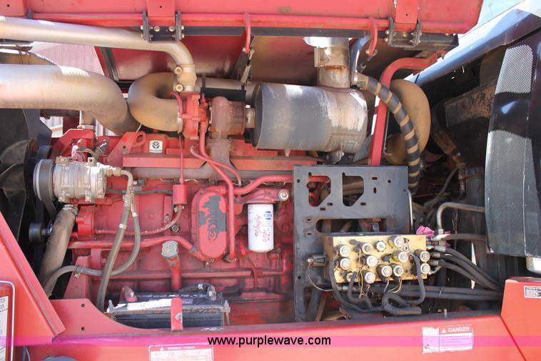 image for item C3892 2006 New Holland HW365 self-propelled windrower