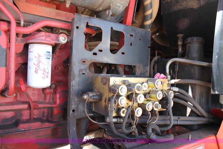 image for item C3892 2006 New Holland HW365 self-propelled windrower