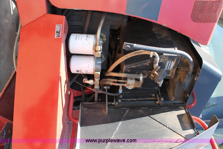 image for item C3892 2006 New Holland HW365 self-propelled windrower