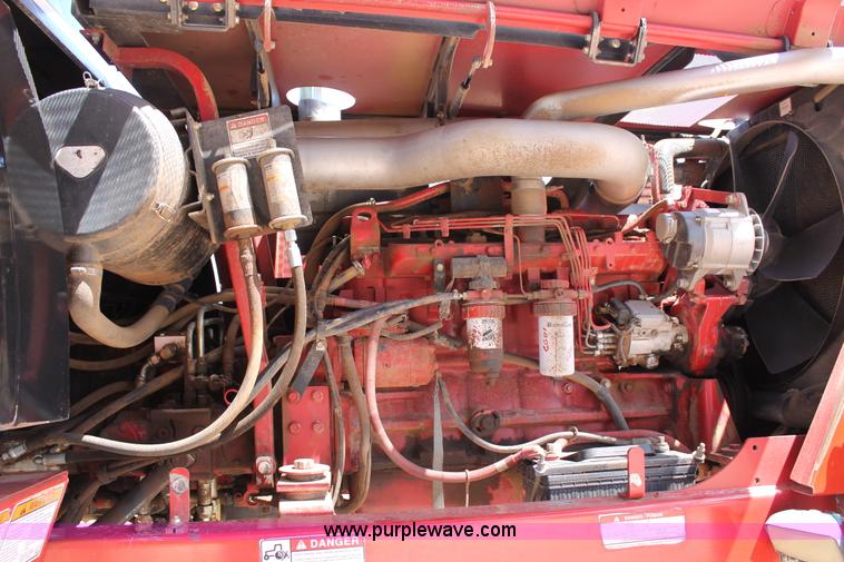 image for item C3892 2006 New Holland HW365 self-propelled windrower