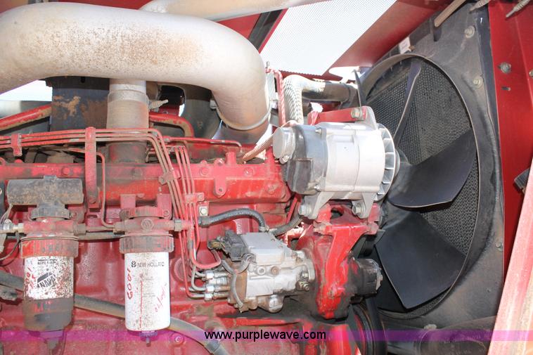 image for item C3892 2006 New Holland HW365 self-propelled windrower