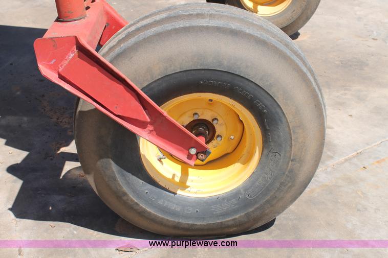 image for item C3892 2006 New Holland HW365 self-propelled windrower