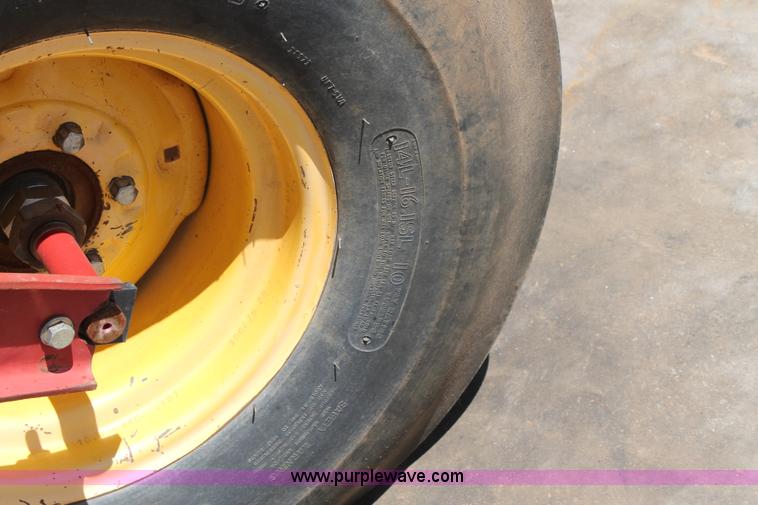 image for item C3892 2006 New Holland HW365 self-propelled windrower