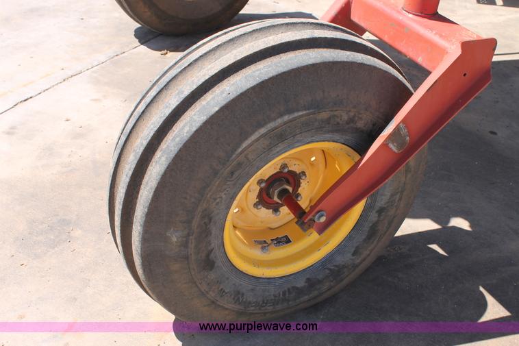 image for item C3892 2006 New Holland HW365 self-propelled windrower