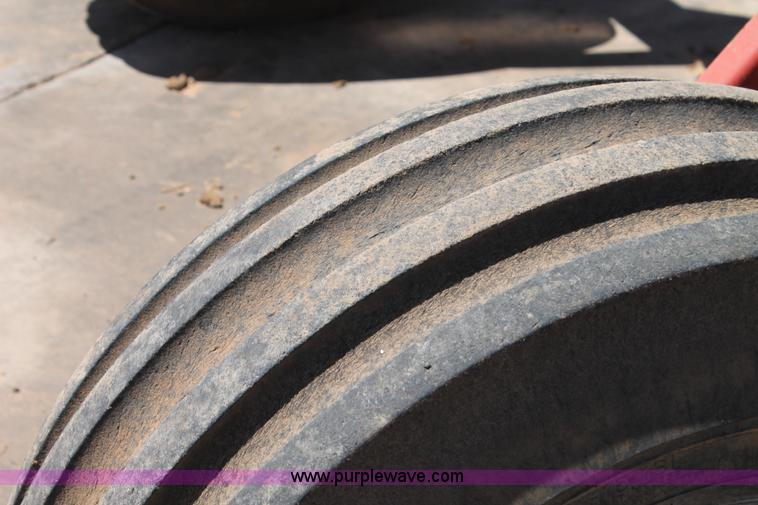 image for item C3892 2006 New Holland HW365 self-propelled windrower