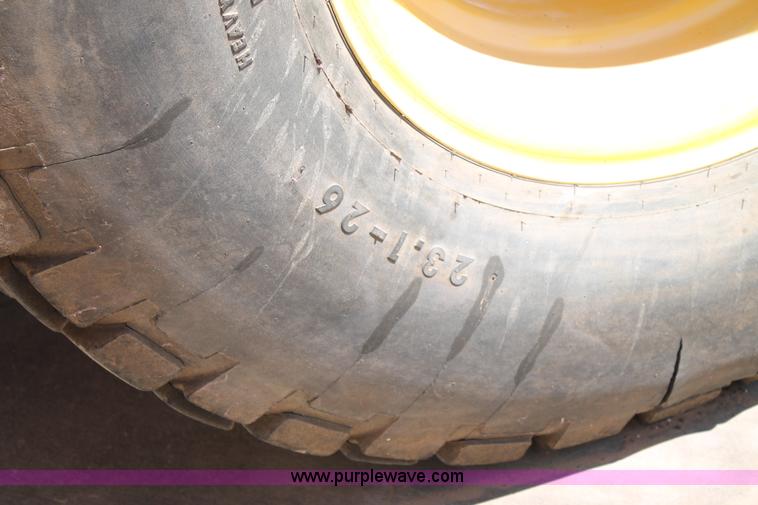 image for item C3892 2006 New Holland HW365 self-propelled windrower