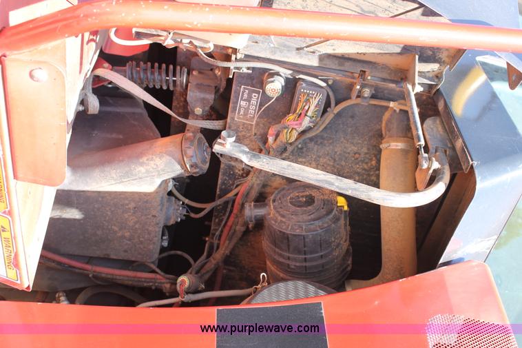 image for item C3892 2006 New Holland HW365 self-propelled windrower