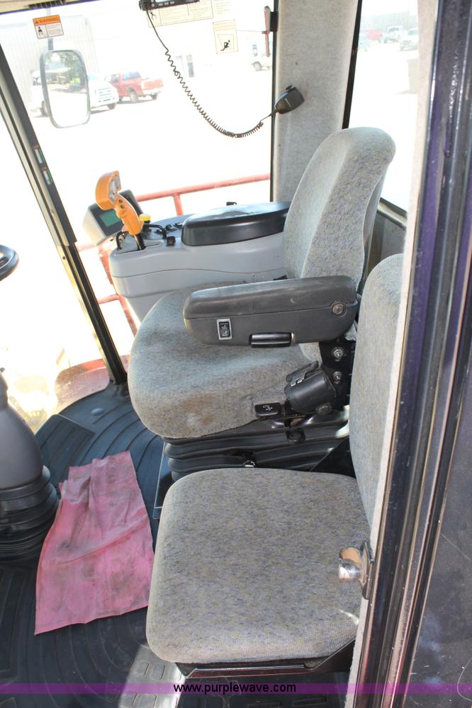 image for item C3892 2006 New Holland HW365 self-propelled windrower