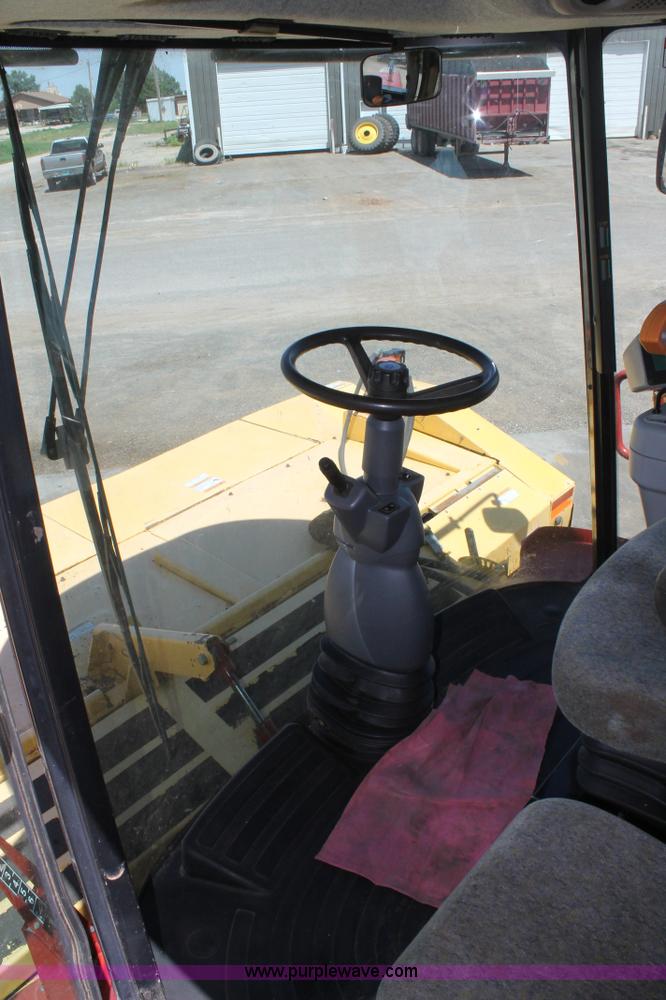 image for item C3892 2006 New Holland HW365 self-propelled windrower