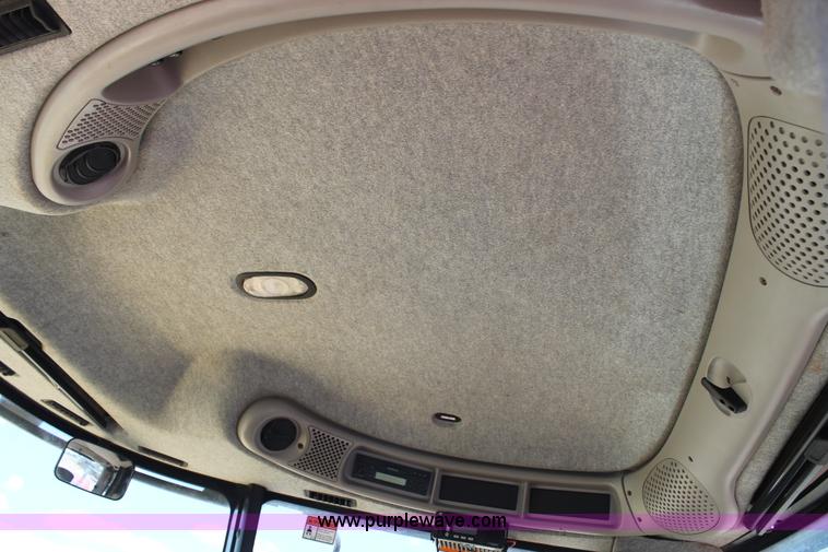 image for item C3892 2006 New Holland HW365 self-propelled windrower