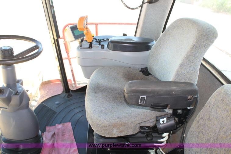 image for item C3892 2006 New Holland HW365 self-propelled windrower